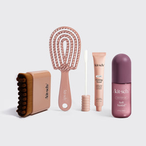 KITSCH Performance Ritual Kit — group shot of the Terracotta Lymphatic Contour Face Brush, Terracotta Detangling Flexi Brush - Mini, Styling Taming Wand with spoolie applicator, and Soft Santal Hair & Body Perfume Mist lined up on a light grey background — formulated with biotin, aloe vera & vitamin E, for slicking flyaways & frizz — the complete post-workout hair & skin reset kit
