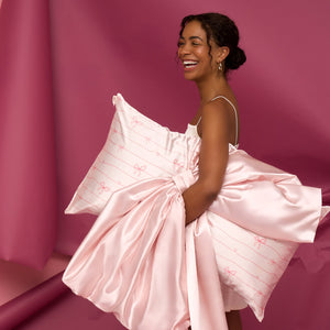 Taie d'oreiller en satin à nœuds rayés