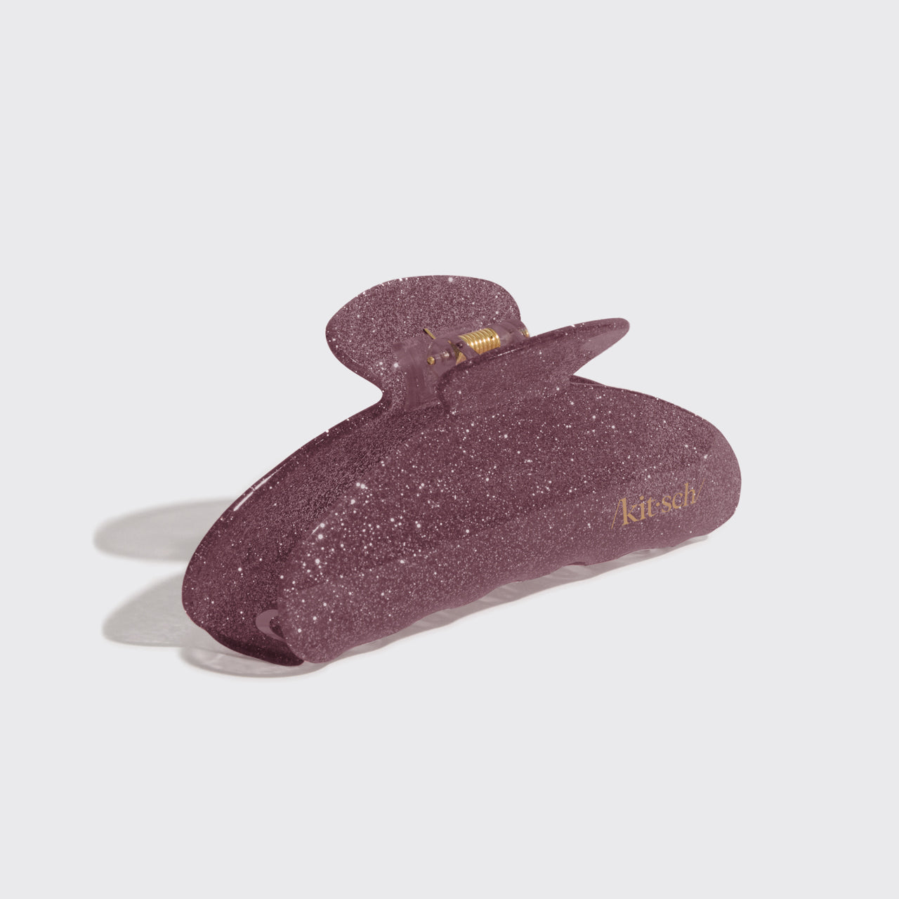 Pinza rosa con purpurina