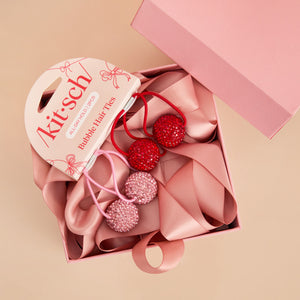 Gomas para el pelo rojas y rosas