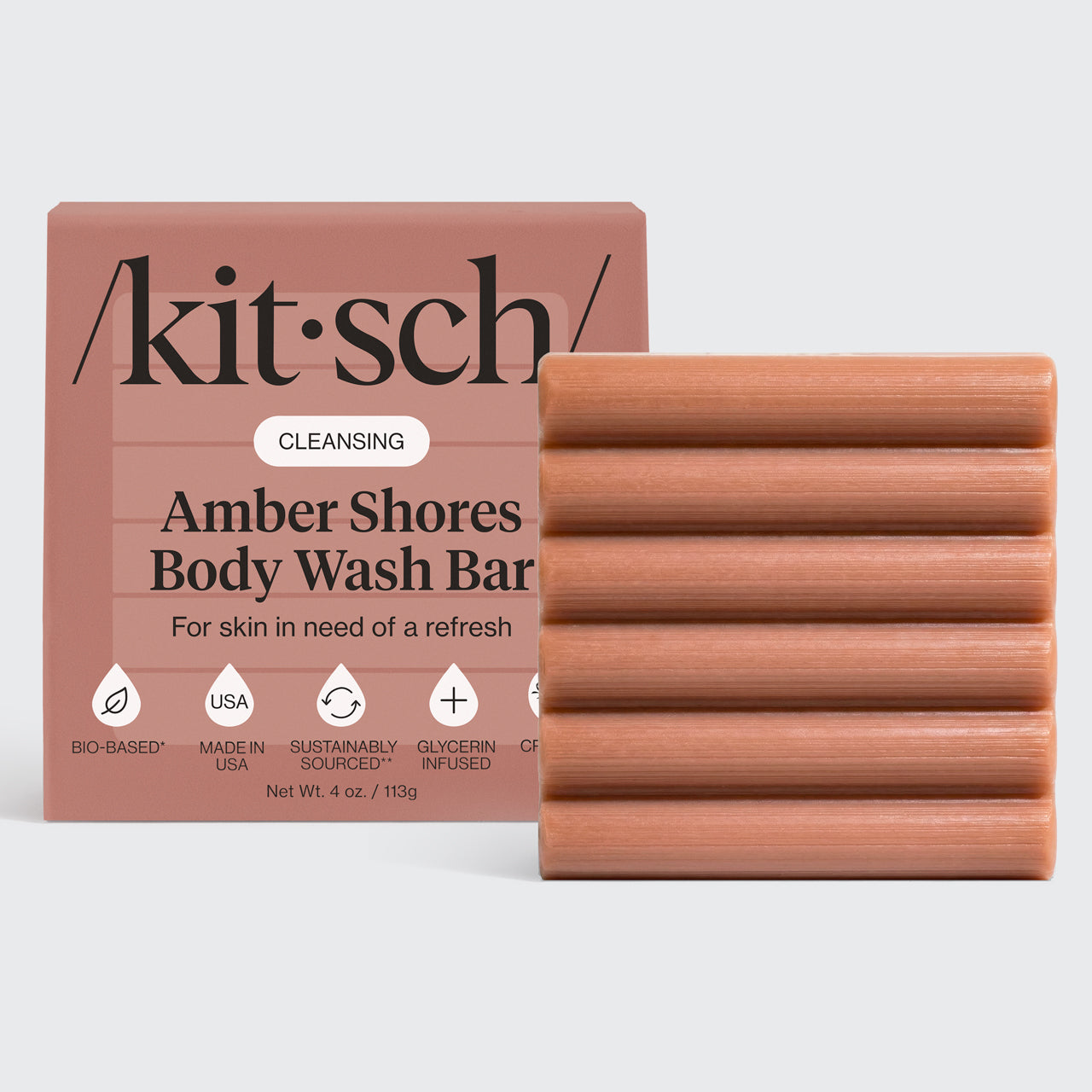 Kitsch Cleansing Amber Shores Body Wash Bar with ridged bar and packaging on a white background