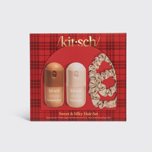 KITSCH Sweet & Silky Hair 4pc Set — front of the red plaid gift box holding the Caramel Cream and Warm Sugar mini hair perfumes and two champagne satin scrunchies on a light gray backdrop — wear each hair perfume solo or layer them to create your own signature scent — quickly refreshes your hair between washes