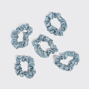 KITSCH Haze Blue Satin Sleep Scrunchies 5pc Set — 5 haze blue satin scrunchies laid flat on a light gray background