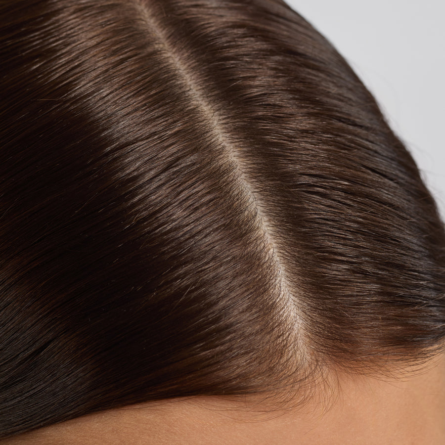 KITSCH Strengthening Rosemary & Biotin Scalp & Hair Oil 2fl oz./60mL — after shot of model hair — Antioxidant blend of argan, jojoba, and castor oils to nourish hair & scalp — for visibly healthier, stronger-looking hair from root to tip