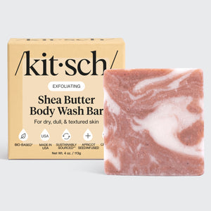 Kitsch Shea Butter Exfoliating Body Wash Bar packaging - super-hydrating bio-based body wash bar with shea butter and plant-derived exfoliants for soft, glowing skin. Almond and shea fragrance, free of parabens, phthalates, silicones, sulfates, and artificial fragrance. Vegan, cruelty-free, made in USA, Leaping Bunny Certified, reduces single-use plastic.