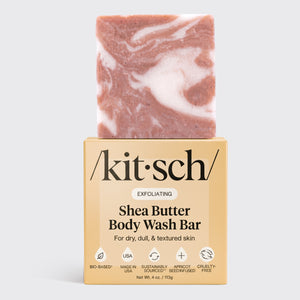 Kitsch Shea Butter Exfoliating Body Wash Bars stacked - super-hydrating bio-based body wash bar with shea butter and plant-derived exfoliants for soft, glowing skin. Almond and shea fragrance, free of parabens, phthalates, silicones, sulfates, and artificial fragrance. Vegan, cruelty-free, made in USA, Leaping Bunny Certified.